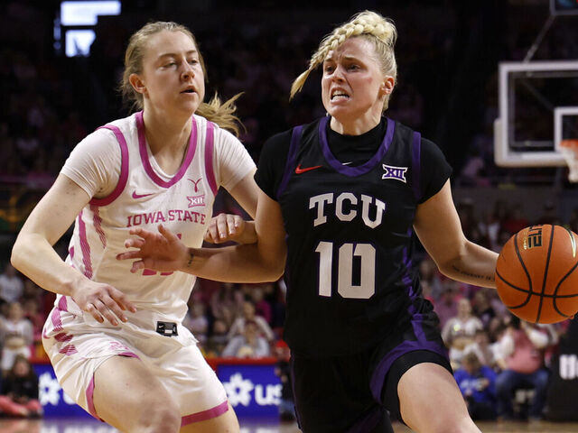 AMES, IA - FEBRUARY 02: Hailey Van Lith #10 of the TCU Horned Frogs drives the ball as Emily Ryan #11 of the Iowa State Cyclones puts pressure on in the second half of play at Hilton Coliseum on February 2, 2025, in Ames, Iowa. The TCU Horned Frogs won 82-69 over the Iowa State Cyclones.