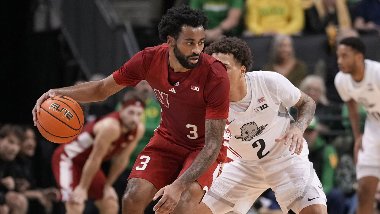 EUGENE, OREGON - FEBRUARY 02: Brice Williams #3 of the Nebraska Cornhuskers dribbles the ball against Jadrian Tracey #2 of the Oregon Ducks during the first half at Matthew Knight Arena on February 02, 2025 in Eugene, Oregon.