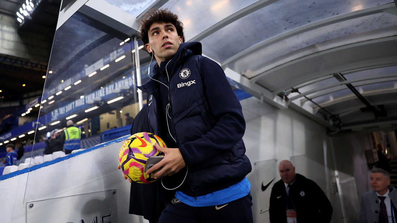 LONDON, ENGLAND - JANUARY 14: Joao Felix of Chelsea leaves the tunnel for a pitch inspection, while holding a match ball prior to the Premier League match between Chelsea FC and AFC Bournemouth at Stamford Bridge on January 14, 2025 in London, England.
