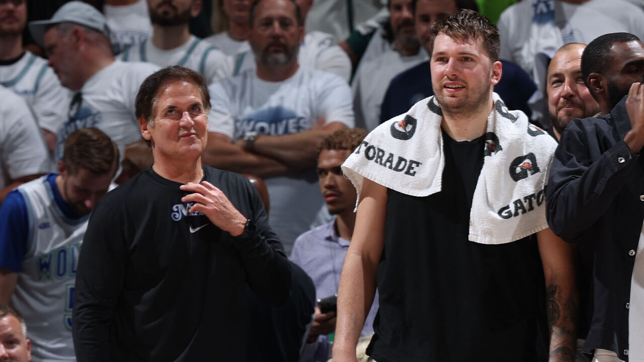 MINNEAPOLIS, MN - MAY 30: Mark Cuban and Luka Doncic #77 of the Dallas Mavericks look on during the game against the Minnesota Timberwolves during Game 5 of the Western Conference Finals during the 2024 NBA Playoffs on May 30, 2024 at Target Center in Minneapolis, Minnesota. Mandatory Copyright Notice: Copyright 2024 NBAE