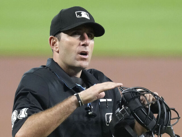 BALTIMORE, MARYLAND - JUNE 23: Umpire Pat Hoberg looks on during a baseball game between the Seattle Mariners and the Baltimore Orioles at Oriole Park at Camden Yards on June 23, 2023 in Baltimore, Maryland.