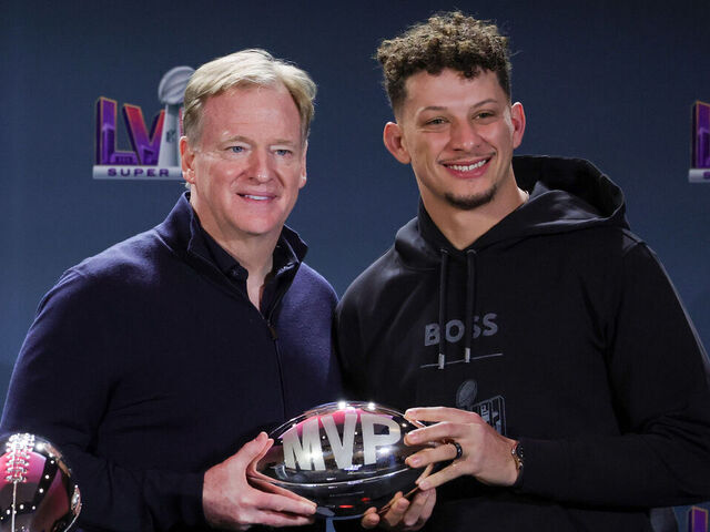 LAS VEGAS, NEVADA - FEBRUARY 12: NFL Commissioner Roger Goodell (L) poses with quarterback Patrick Mahomes #15 of the Kansas City Chiefs and the MVP award during a news conference for the winning head coach and MVP of Super Bowl LVIII at the Mandalay Bay Convention Center on February 12, 2024 in Las Vegas, Nevada.