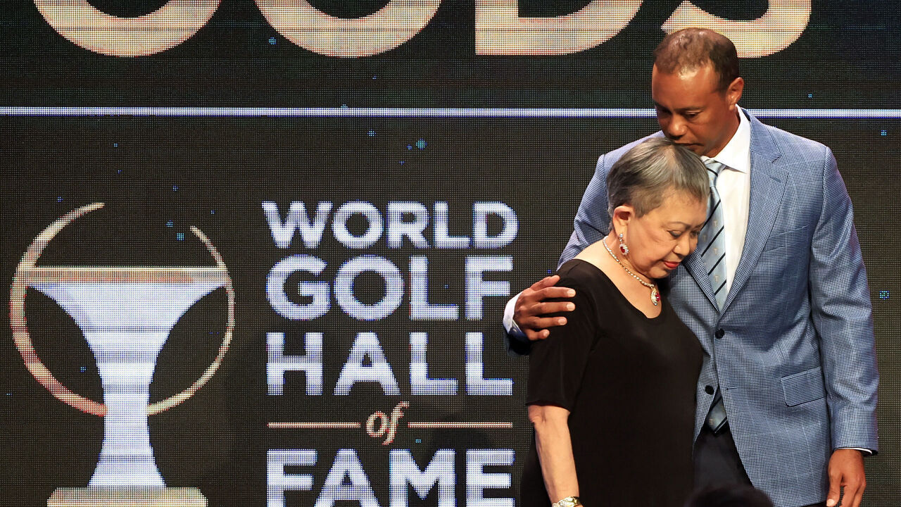 PONTE VEDRA BEACH, FLORIDA - MARCH 09: Tiger Woods and his mother Kultida Woods react as they pose for photos prior to his induction at the 2022 World Golf Hall of Fame Induction at the PGA TOUR Global Home on March 09, 2022 in Ponte Vedra Beach, Florida.