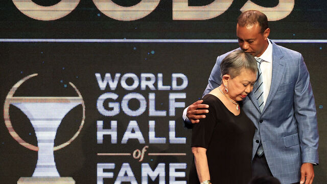 PONTE VEDRA BEACH, FLORIDA - MARCH 09: Tiger Woods and his mother Kultida Woods react as they pose for photos prior to his induction at the 2022 World Golf Hall of Fame Induction at the PGA TOUR Global Home on March 09, 2022 in Ponte Vedra Beach, Florida.