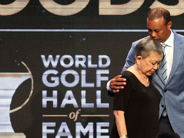 PONTE VEDRA BEACH, FLORIDA - MARCH 09: Tiger Woods and his mother Kultida Woods react as they pose for photos prior to his induction at the 2022 World Golf Hall of Fame Induction at the PGA TOUR Global Home on March 09, 2022 in Ponte Vedra Beach, Florida.