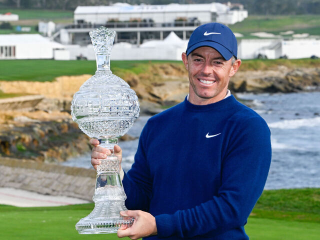 PEBBLE BEACH, CA - FEBRUARY 02: Rory McIlroy (NIR) holds nthe trophy for winning the AT&T Pebble Beach Pro-Am at Pebble Beach Golf Links on February 2, 2025, in Pebble Beach, California.
