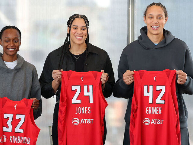 ATLANTA, GEORGIA - FEBRUARY 04: Shatori Walker-Kimbrough #32, Brionna Jones #24 and Brittney Griner #42 pose with their jerseys during a press conference after being introduced as new free agent signings for the Atlanta Dream at Ventanas on February 04, 2025 in Atlanta, Georgia.