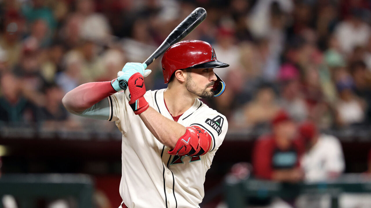 PHOENIX, ARIZONA - SEPTEMBER 27: Randal Grichuk #15 of the Arizona Diamondbacks bats during the game against the San Diego Padres at Chase Field on September 27, 2024 in Phoenix, Arizona. The Padres defeated the Diamondbacks 5-3.