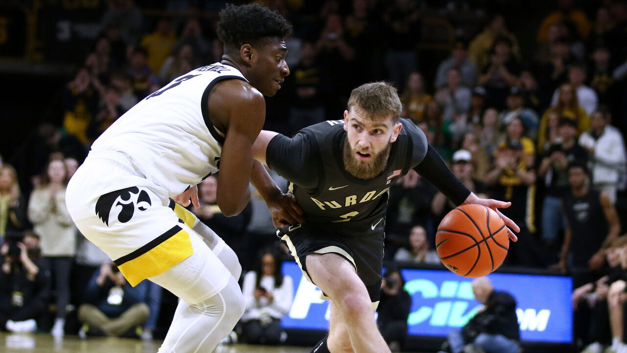 IOWA CITY, IOWA- FEBRUARY 4: Guard Braden Smith #3 of the Purdue Boilermakers goes down the court during the first half against guard Drew Thelwell #3 of the Iowa Hawkeyes, at Carver-Hawkeye Arena on February 4, 2025 in Iowa City, Iowa.