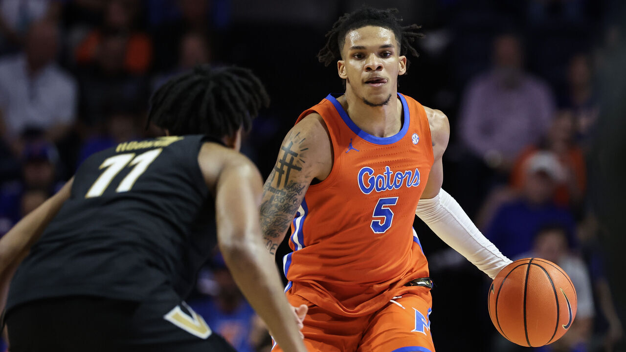 GAINESVILLE, FLORIDA - FEBRUARY 04: Will Richard #5 of the Florida Gators brings the ball up court during the first half against the Vanderbilt Commodores at Stephen C. O'Connell Center on February 04, 2025 in Gainesville, Florida.