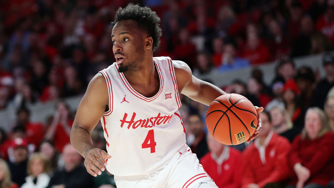 HOUSTON, TEXAS - JANUARY 06: L.J. Cryer #4 of the Houston Cougars handles the ball against the TCU Horned Frogs during the first half at Fertitta Center on January 06, 2025 in Houston, Texas.