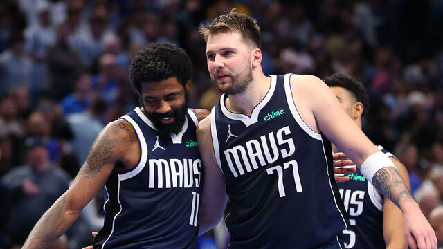 DALLAS, TEXAS - DECEMBER 03: Luka Doncic #77 of the Dallas Mavericks and Kyrie Irving #11 celebrate during the second half of an Emirates NBA Cup game against the Memphis Grizzlies at American Airlines Center on December 03, 2024 in Dallas, Texas. NOTE TO USER: User expressly acknowledges and agrees that, by downloading and/or using this photograph, user is consenting to the terms and conditions of the Getty Images License Agreement.