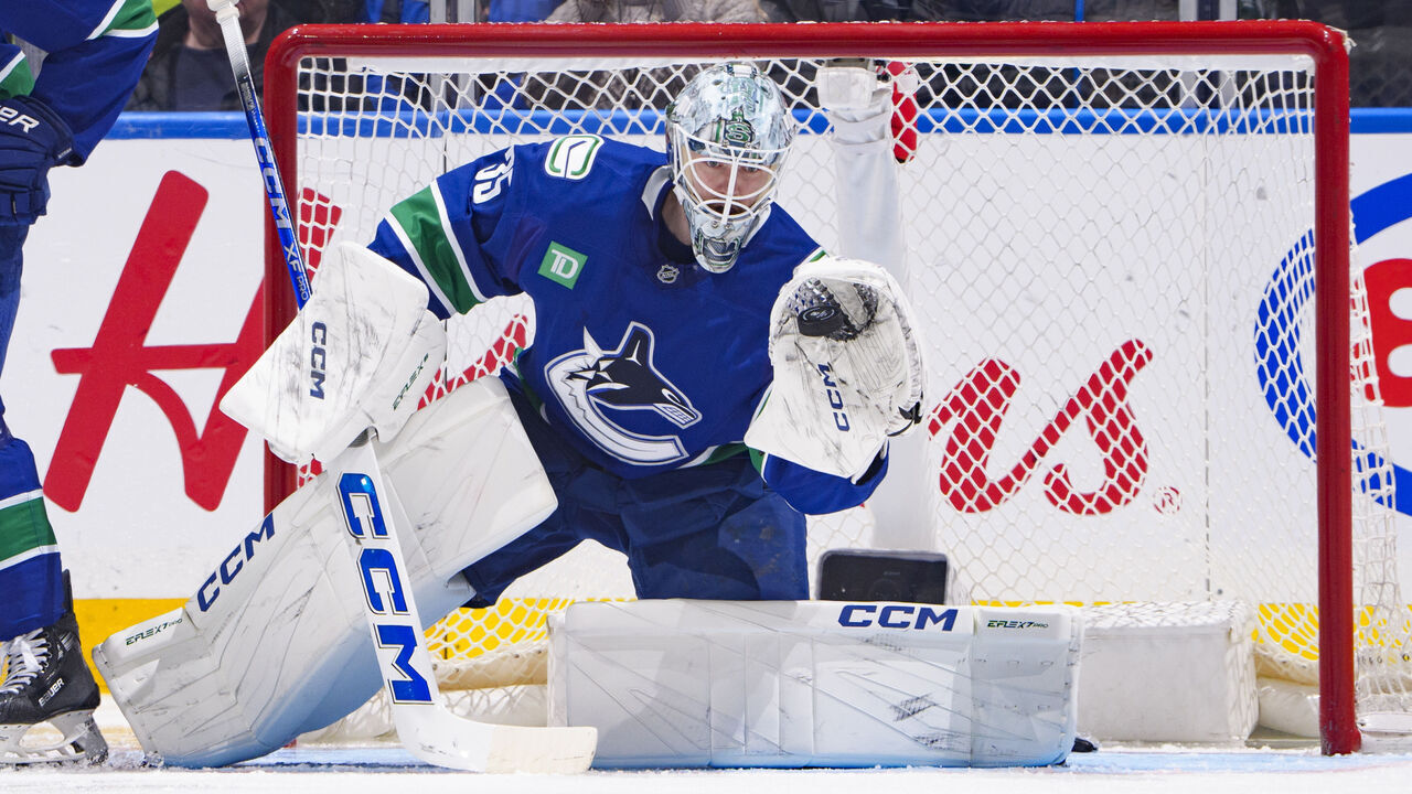 VANCOUVER, CANADA - FEBRUARY 4: Thatcher Demko #35 of the Vancouver Canucks saves a shot during the third period of their NHL game against the Colorado Avalanche at Rogers Arena on February 4, 2025 in Vancouver, British Columbia, Canada.