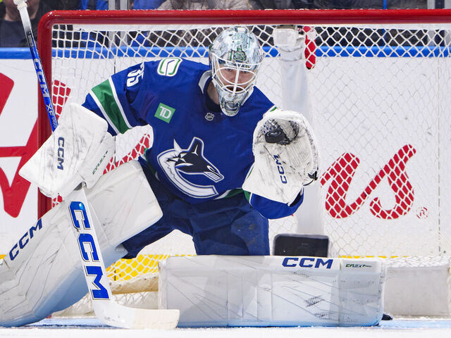 VANCOUVER, CANADA - FEBRUARY 4: Thatcher Demko #35 of the Vancouver Canucks saves a shot during the third period of their NHL game against the Colorado Avalanche at Rogers Arena on February 4, 2025 in Vancouver, British Columbia, Canada.