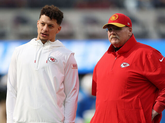 INGLEWOOD, CALIFORNIA - JANUARY 07: Patrick Mahomes #15 of the Kansas City Chiefs and head coach Andy Reid speak before a game against the Los Angeles Chargers at SoFi Stadium on January 07, 2024 in Inglewood, California.