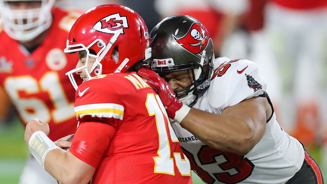 TAMPA, FL - FEBRUARY 07: Ndamukong Suh (93) of the Buccaneers takes down Patrick Mahomes (15) of the Chiefs as Mahomes grimaces in pain during the Super Bowl LV game between the Kansas City Chiefs and the Tampa Bay Buccaneers on February 7, 2021 at Raymond James Stadium, in Tampa, FL.