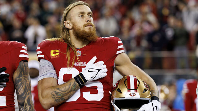 SANTA CLARA, CALIFORNIA - DECEMBER 12: Tight end George Kittle #85 of the San Francisco 49ers stands on the sidelines during the national anthem prior to an NFL football game against the Los Angeles Rams, at Levi's Stadium on December 12, 2024 in Santa Clara, California.