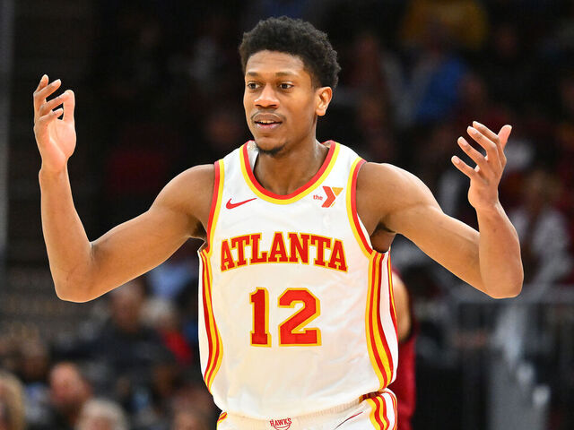 CLEVELAND, OHIO - JANUARY 30: De'Andre Hunter #12 of the Atlanta Hawks reacts during the third quarter against the Cleveland Cavaliers at Rocket Mortgage Fieldhouse on January 30, 2025 in Cleveland, Ohio. The Cavaliers defeated the Hawks 137-115.