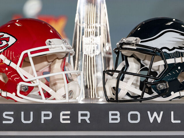 NEW ORLEANS, LOUISIANA - FEBRUARY 03: A detail shot of the Lombardi Trophy next to Kansas City Chiefs and Philadelphia Eagles helmets prior to a news conference on February 03, 2025 in New Orleans, Louisiana ahead of the NFL Super Bowl LIX football game between the Philadelphia Eagles and the Kansas City Chiefs.