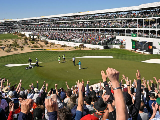 SCOTTSDALE, ARIZONA - FEBRUARY 10: Rickie Fowler reacts to the crowd after making a putt on the 16th green during the second round of the WM Phoenix Open at TPC Scottsdale on February 10, 2023 in Scottsdale, Arizona.