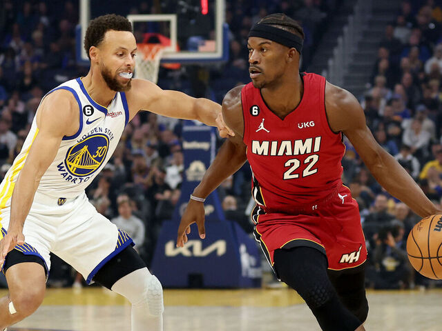 SAN FRANCISCO, CALIFORNIA - OCTOBER 27: Jimmy Butler #22 of the Miami Heat is guarded by Stephen Curry #30 of the Golden State Warriors at Chase Center on October 27, 2022 in San Francisco, California.