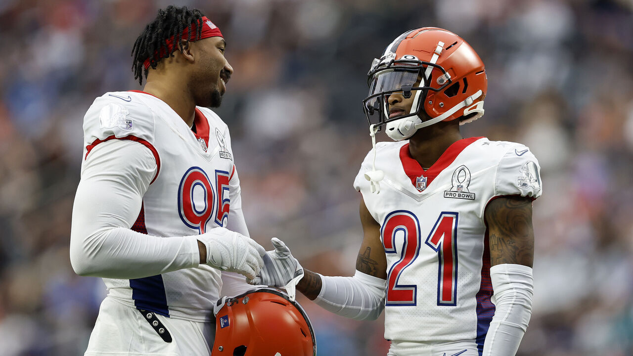 LAS VEGAS, NEVADA - FEBRUARY 06: Myles Garrett #95 and Denzel Ward #21 of the Cleveland Browns and AFC look on during the first half of the 2022 NFL Pro Bowl against the NFC at Allegiant Stadium on February 06, 2022 in Las Vegas, Nevada.