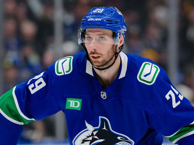 VANCOUVER, CANADA - FEBRUARY 2: Marcus Pettersson #29 of the Vancouver Canucks looks on during the first period of their NHL game against the Detroit Red Wings at Rogers Arena on February 2, 2025 in Vancouver, British Columbia, Canada.