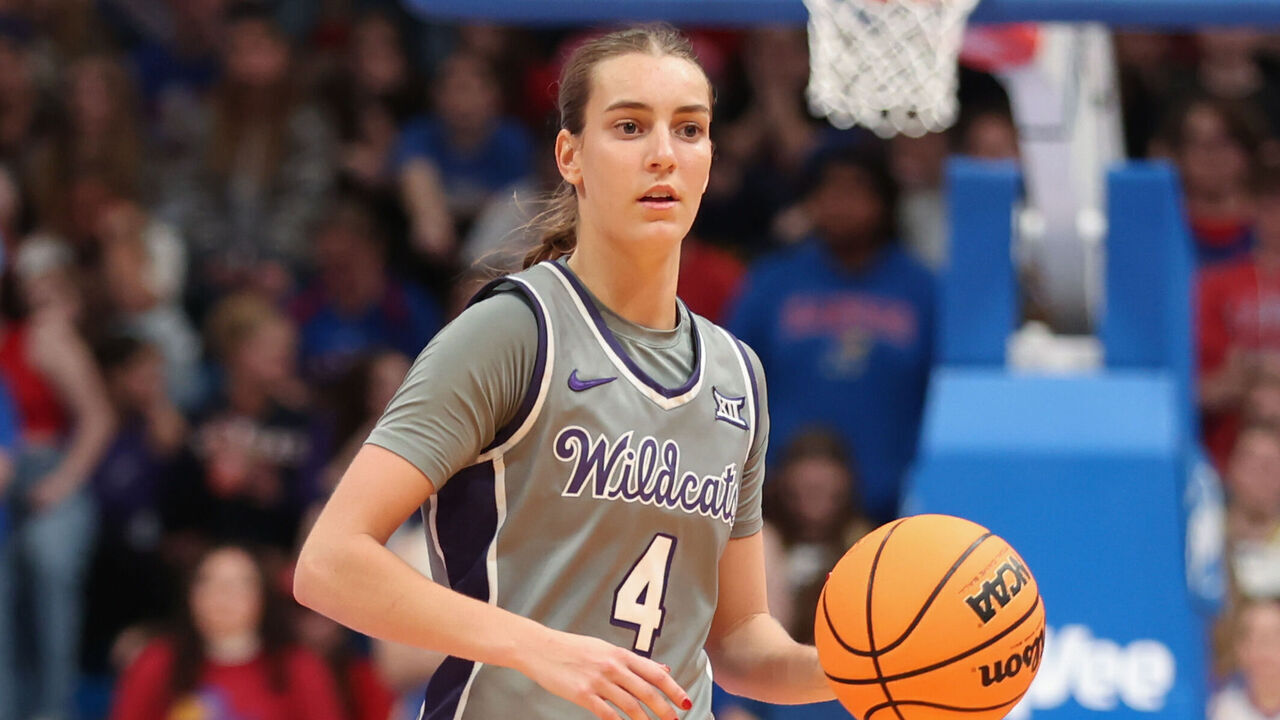 LAWRENCE, KS - FEBRUARY 02: Kansas State Wildcats guard Serena Sundell (4) brings the ball up court in the fourth quarter of a Big 12 women's basketball game between the Kansas State Wildcats and Kansas Jayhawks on February 2, 2025 at Allen Fieldhouse in Lawrence, KS.