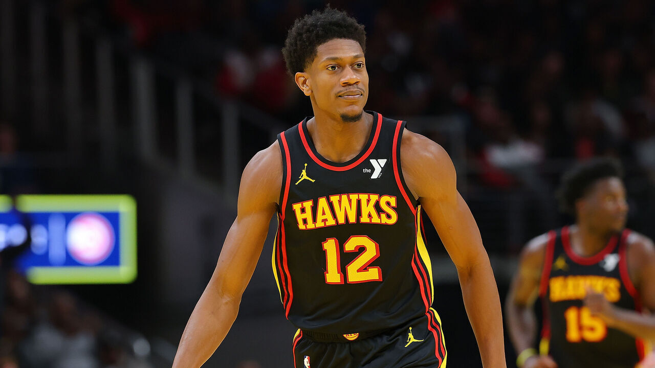 ATLANTA, GEORGIA - NOVEMBER 29: De'Andre Hunter #12 of the Atlanta Hawks reacts after a three-point basket against the Cleveland Cavaliers during the third quarter of the Emirates NBA Cup game at State Farm Arena on November 29, 2024 in Atlanta, Georgia. NOTE TO USER: User expressly acknowledges and agrees that, by downloading and/or using this photograph, user is consenting to the terms and conditions of the Getty Images License Agreement.