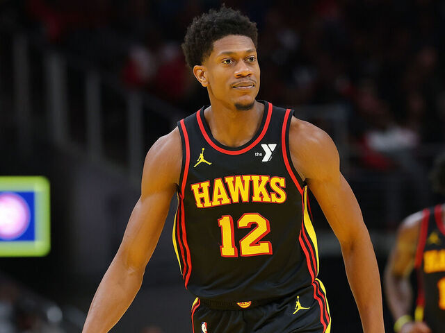 ATLANTA, GEORGIA - NOVEMBER 29: De'Andre Hunter #12 of the Atlanta Hawks reacts after a three-point basket against the Cleveland Cavaliers during the third quarter of the Emirates NBA Cup game at State Farm Arena on November 29, 2024 in Atlanta, Georgia. NOTE TO USER: User expressly acknowledges and agrees that, by downloading and/or using this photograph, user is consenting to the terms and conditions of the Getty Images License Agreement.