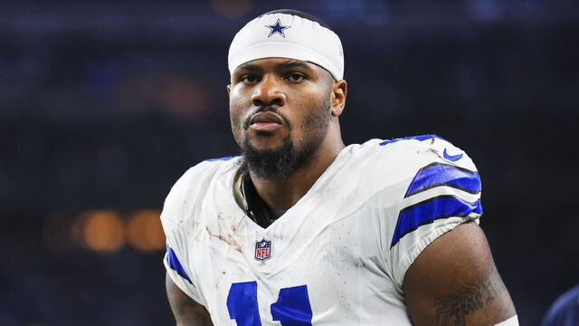 ARLINGTON, TX - DECEMBER 22: Micah Parsons #11 of the Dallas Cowboys looks on from the field during an NFL football game against the Tampa Bay Buccaneers at AT&T Stadium on December 22, 2024 in Arlington, Texas.
