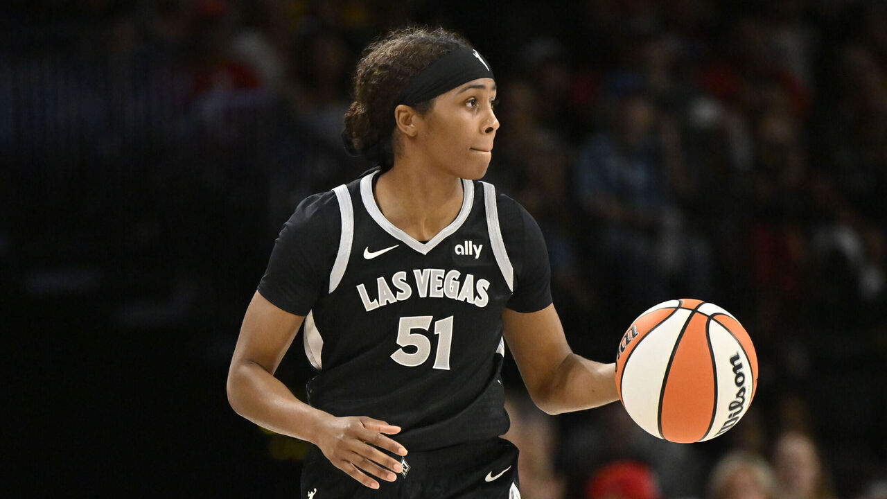 LAS VEGAS, NV - OCTOBER 6: Sydney Colson #51 of the Las Vegas Aces dribbles the ball during the game against the New York Liberty during Round 2 Game 4 of the 2024 WNBA Playoffs on October 6, 2024 at Michelob ULTRA Arena in Las Vegas, Nevada. Mandatory Copyright Notice: Copyright 2024 NBAE