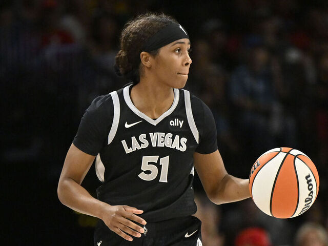 LAS VEGAS, NV - OCTOBER 6: Sydney Colson #51 of the Las Vegas Aces dribbles the ball during the game against the New York Liberty during Round 2 Game 4 of the 2024 WNBA Playoffs on October 6, 2024 at Michelob ULTRA Arena in Las Vegas, Nevada. Mandatory Copyright Notice: Copyright 2024 NBAE