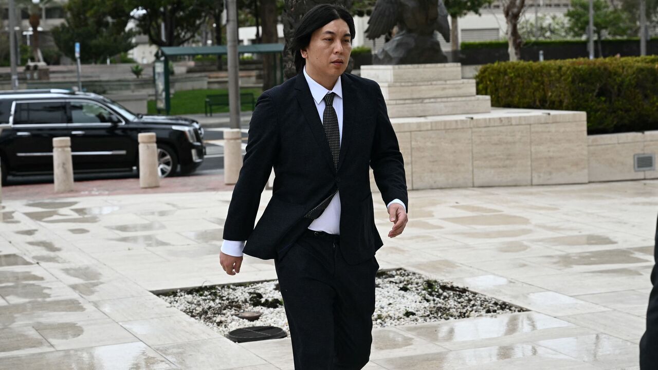 Ippei Mizuhara arrives for his sentencing at the Ronald Reagan Federal Building and Courthouse in Santa Ana, California, on February 6, 2025. Shohei Ohtani's former interpreter, Mizuhara, is scheduled to be sentenced February 6 after pleading guilty over charges of illegally transferring nearly $17 million from the baseball star's bank account in order to pay off gambling debts.