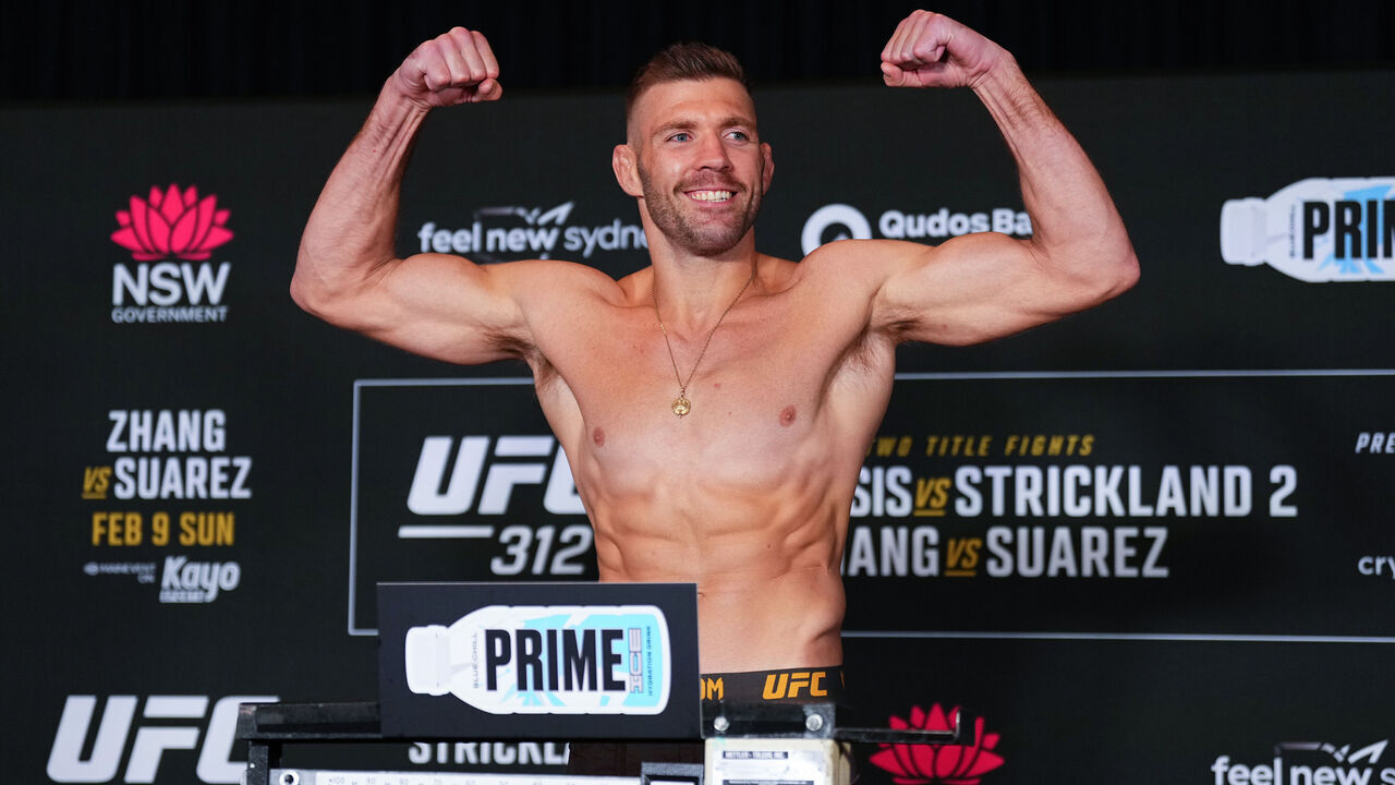 SYDNEY, AUSTRALIA - FEBRUARY 07: Dricus Du Plessis of South Africa poses on the scale during the UFC 312 official weigh-in at the Hilton Sydney on February 07, 2025 in Sydney, Australia.