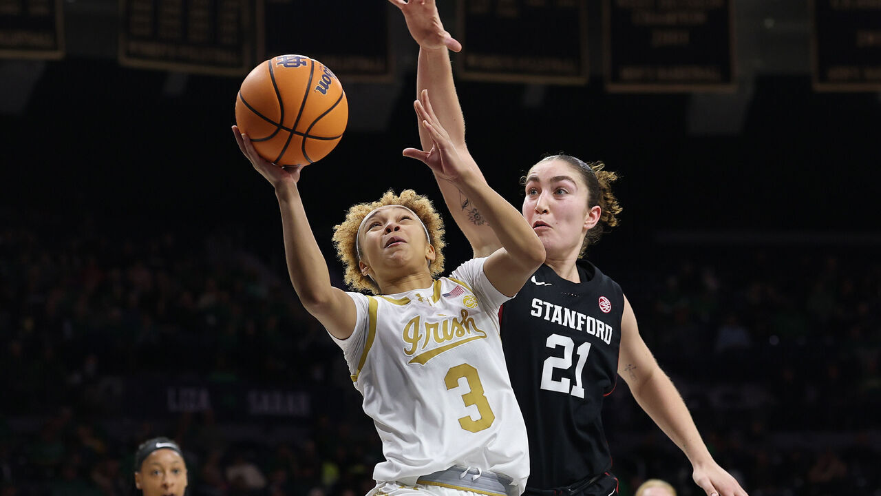 SOUTH BEND, INDIANA - FEBRUARY 06: Hannah Hidalgo #3 of the Notre Dame Fighting Irish goes up for a layup against Brooke Demetre #21 of the Stanford Cardinal during the second half at Purcell Pavilion at the Joyce Center on February 06, 2025 in South Bend, Indiana.