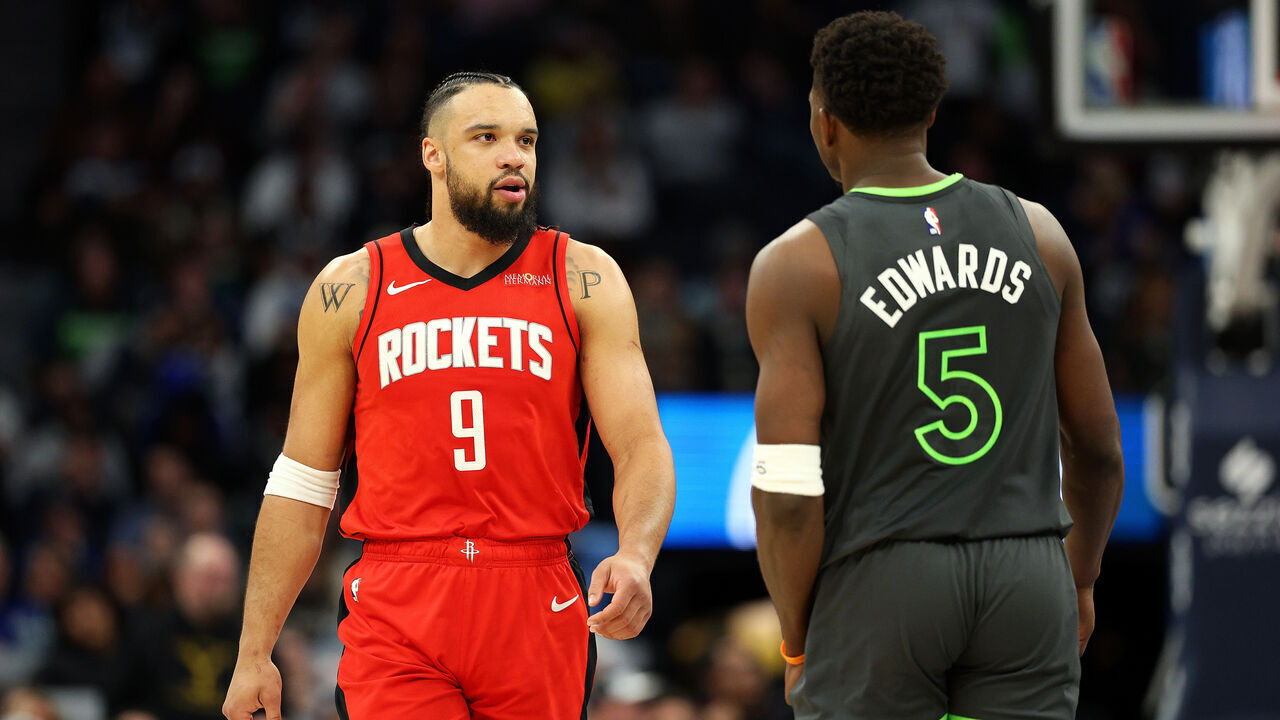 MINNEAPOLIS, MINNESOTA - FEBRUARY 06: Dillon Brooks #9 of the Houston Rockets interacts with Anthony Edwards #5 of the Minnesota Timberwolves in the second quarter at Target Center on February 06, 2025 in Minneapolis, Minnesota.