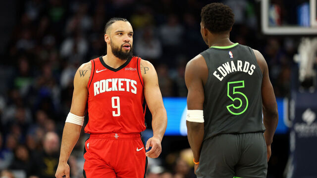 MINNEAPOLIS, MINNESOTA - FEBRUARY 06: Dillon Brooks #9 of the Houston Rockets interacts with Anthony Edwards #5 of the Minnesota Timberwolves in the second quarter at Target Center on February 06, 2025 in Minneapolis, Minnesota.