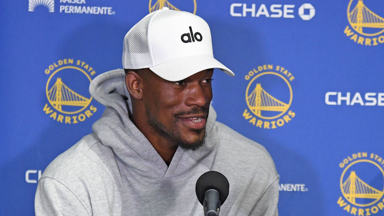 LOS ANGELES, CA - FEBRUARY 6: Jimmy Butler #10 of the Golden State Warriors is introduced by Michael Joseph Dunleavy Jr. during a press conference before the game against the Los Angeles Lakers on February 6, 2025 at Crypto.Com Arena in Los Angeles, California. NOTE TO USER: User expressly acknowledges and agrees that, by downloading and/or using this Photograph, user is consenting to the terms and conditions of the Getty Images License Agreement. Mandatory Copyright Notice: Copyright 2025 NBAE