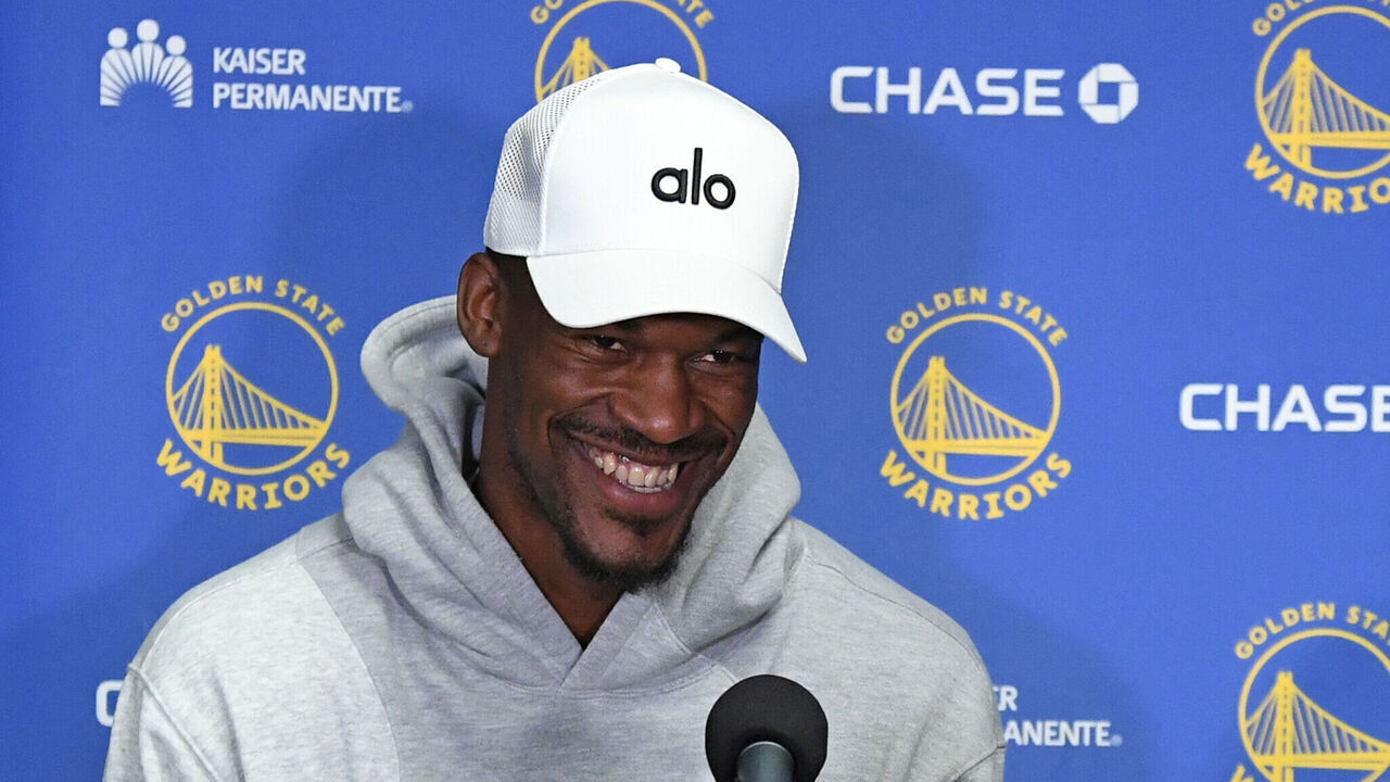 LOS ANGELES, CA - FEBRUARY 6: Jimmy Butler #10 of the Golden State Warriors is introduced by Mike Dunleavy during a press conference before the game against the Los Angeles Lakers on February 6, 2025 at Crypto.Com Arena in Los Angeles, California. NOTE TO USER: User expressly acknowledges and agrees that, by downloading and/or using this Photograph, user is consenting to the terms and conditions of the Getty Images License Agreement. Mandatory Copyright Notice: Copyright 2025 NBAE