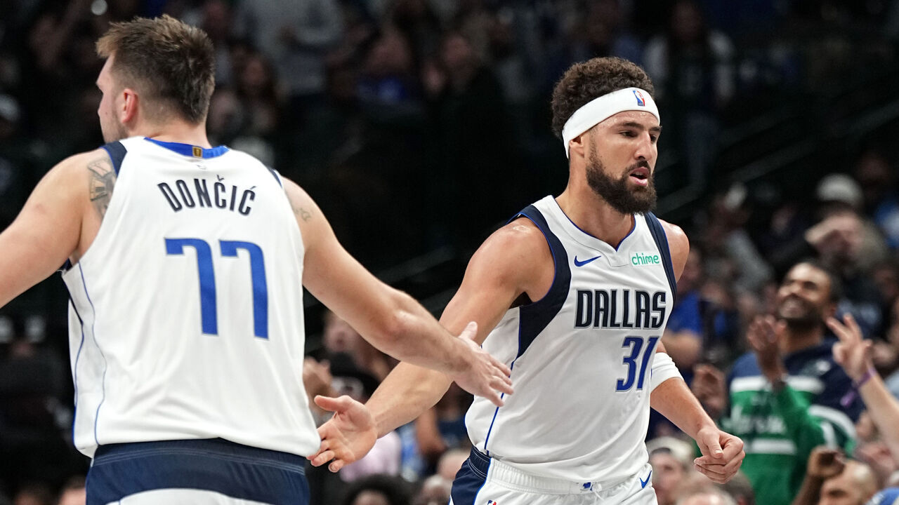 DALLAS, TX - NOVEMBER 4: Luka Doncic #77 and Klay Thompson #31 of the Dallas Mavericks high five during the game against the Indiana Pacers on November 4, 2024 at the American Airlines Center in Dallas, Texas. Mandatory Copyright Notice: Copyright 2024 NBAE