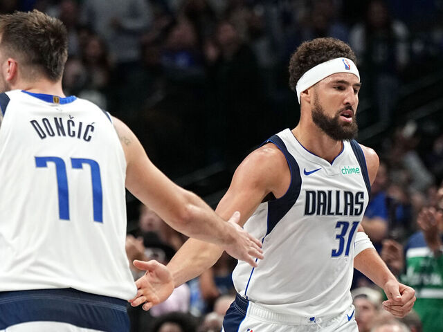 DALLAS, TX - NOVEMBER 4: Luka Doncic #77 and Klay Thompson #31 of the Dallas Mavericks high five during the game against the Indiana Pacers on November 4, 2024 at the American Airlines Center in Dallas, Texas. Mandatory Copyright Notice: Copyright 2024 NBAE