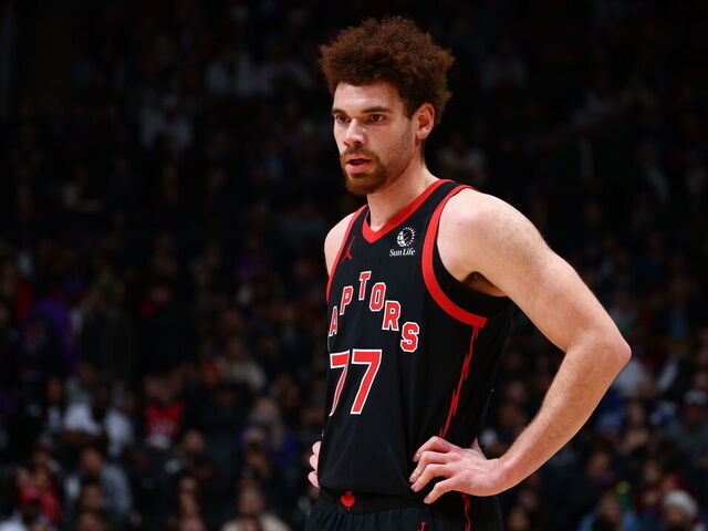 TORONTO, CANADA - DECEMBER 22: Jamison Battle #77 of the Toronto Raptors during the game against the Houston Rockets on December 22, 2024 at the Scotiabank Arena in Toronto, Ontario, Canada. Mandatory Copyright Notice: Copyright 2024 NBAE