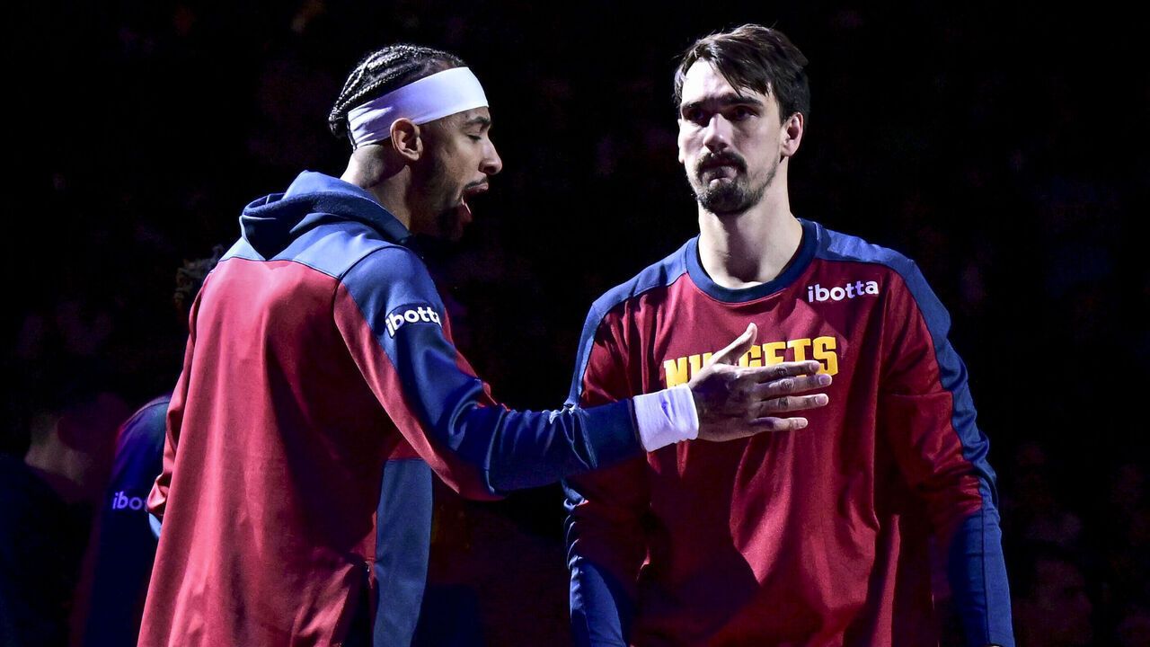 DENVER, CO - JANUARY 7: Dario Saric (9) of the Denver Nuggets is introduced as Zeke Nnaji (22) gasses him up before the first quarter against the Boston Celtics at Ball Arena in Denver, Colorado on Tuesday, January 7, 2025.