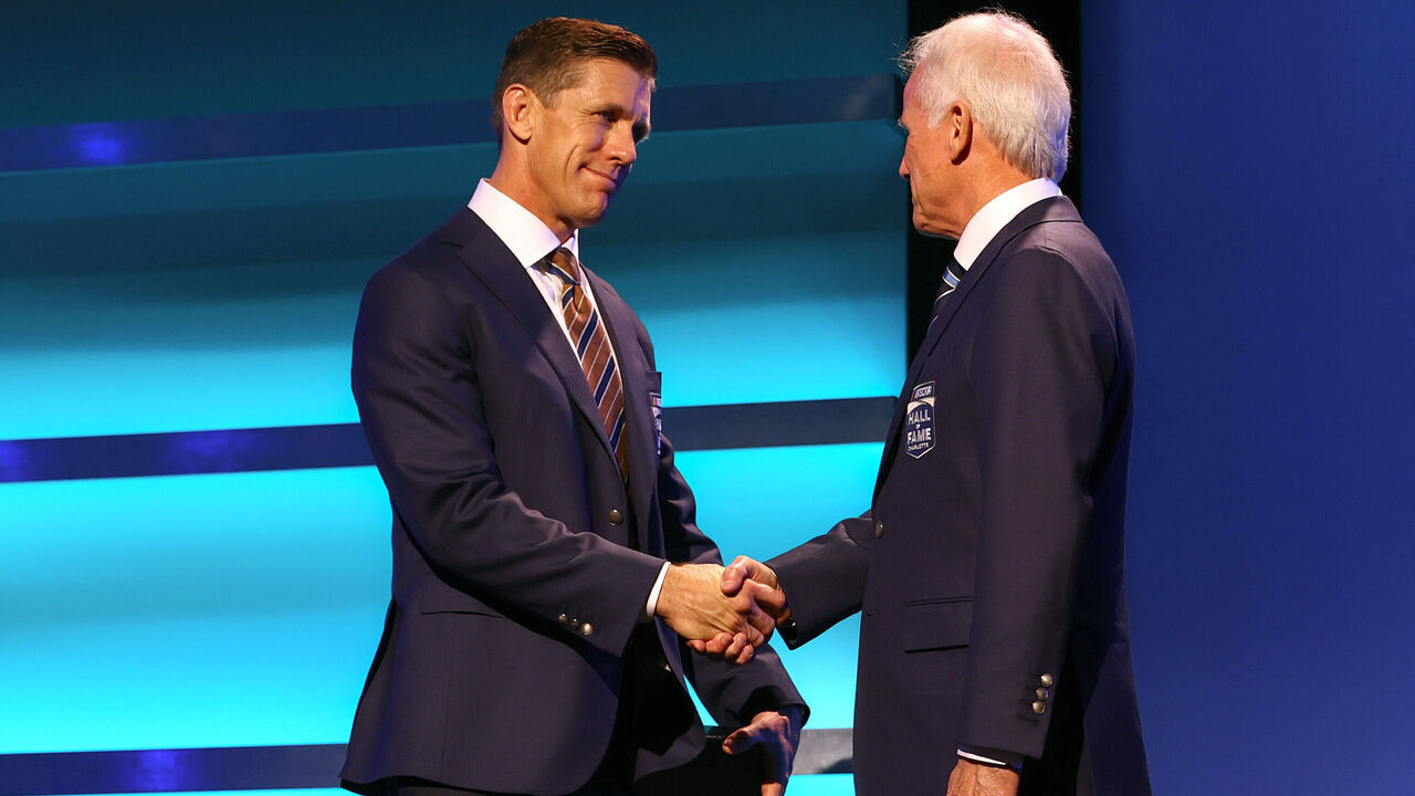 CHARLOTTE, NORTH CAROLINA - FEBRUARY 07: 2025 Hall of Fame inductees, Carl Edwards (L) and Ricky Rudd shake hands onstage during the 2025 NASCAR Hall of Fame Induction Ceremony at Charlotte Convention Center on February 07, 2025 in Charlotte, North Carolina.
