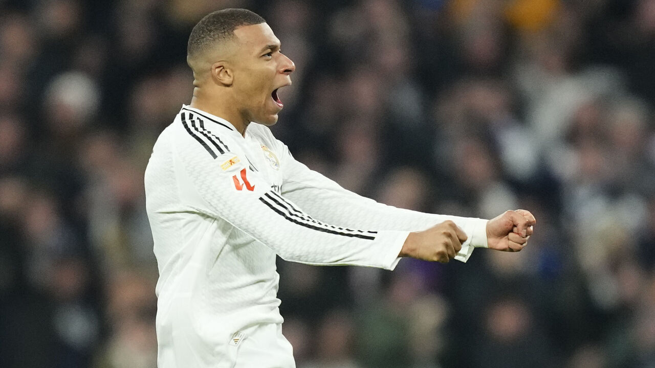 Kylian Mbappe centre-forward of Real Madrid and France celebrates after scoring his sides first goal during the La Liga match between Real Madrid CF and Atletico de Madrid at Estadio Santiago Bernabeu on February 8, 2025 in Madrid, Spain.