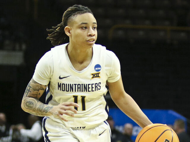 IOWA CITY, IOWA- MARCH 23: Guard JJ Quinerly #11 of the West Virginia Mountaineers goes down the court during the second half against the Princeton Tigers during their match-up in the 2024 NCAA Division 1 Womens Basketball Championship at Carver-Hawkeye Arena on March 23, 2024 in Iowa City, Iowa.