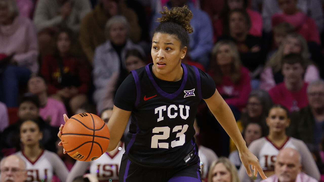 AMES, IA - FEBRUARY 2: Aaliyah Roberson #23 of the TCU Horned Frogs drives the ball in the second half of play at Hilton Coliseum on February 2, 2025, in Ames, Iowa. The TCU Horned Frogs won 82-69 over the Iowa State Cyclones.