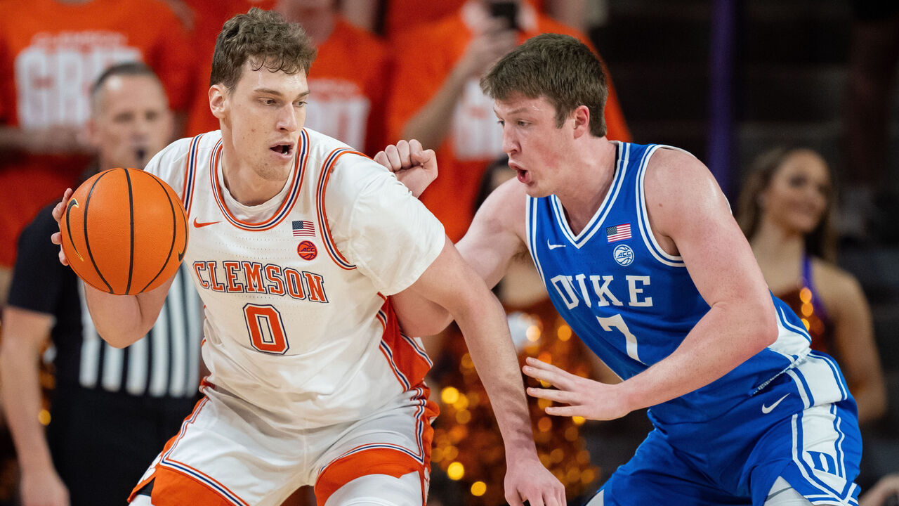 CLEMSON, SOUTH CAROLINA - FEBRUARY 08: Kon Knueppel #7 of the Duke Blue Devils guards Viktor Lakhin #0 of the Clemson Tigers in the first half during their game at Littlejohn Coliseum on February 08, 2025 in Clemson, South Carolina.