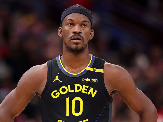 CHICAGO, ILLINOIS - FEBRUARY 08: Jimmy Butler #10 of the Golden State Warriors looks on against the Chicago Bulls during the first half at the United Center on February 08, 2025 in Chicago, Illinois.